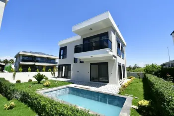 Side detached modern villa with pool and garden